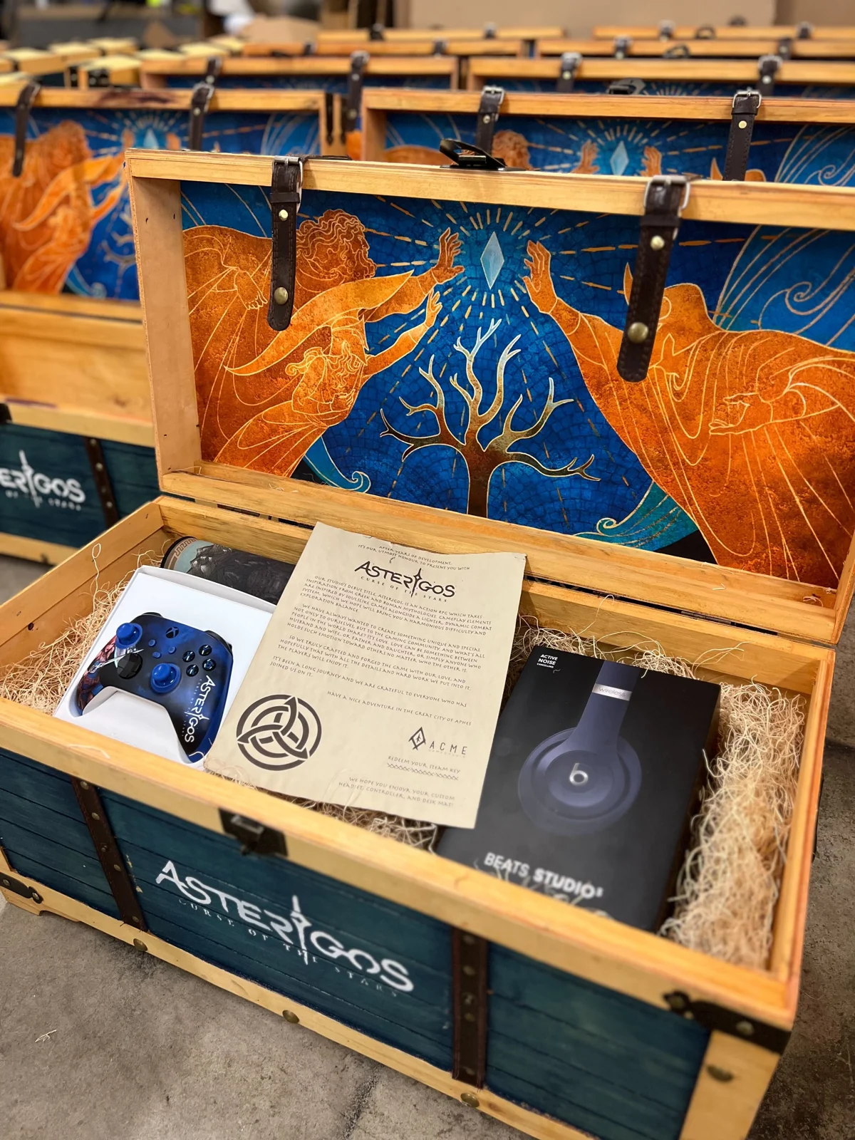 Asterigos wooden press kit chest with illustrated lining and custom merchandise